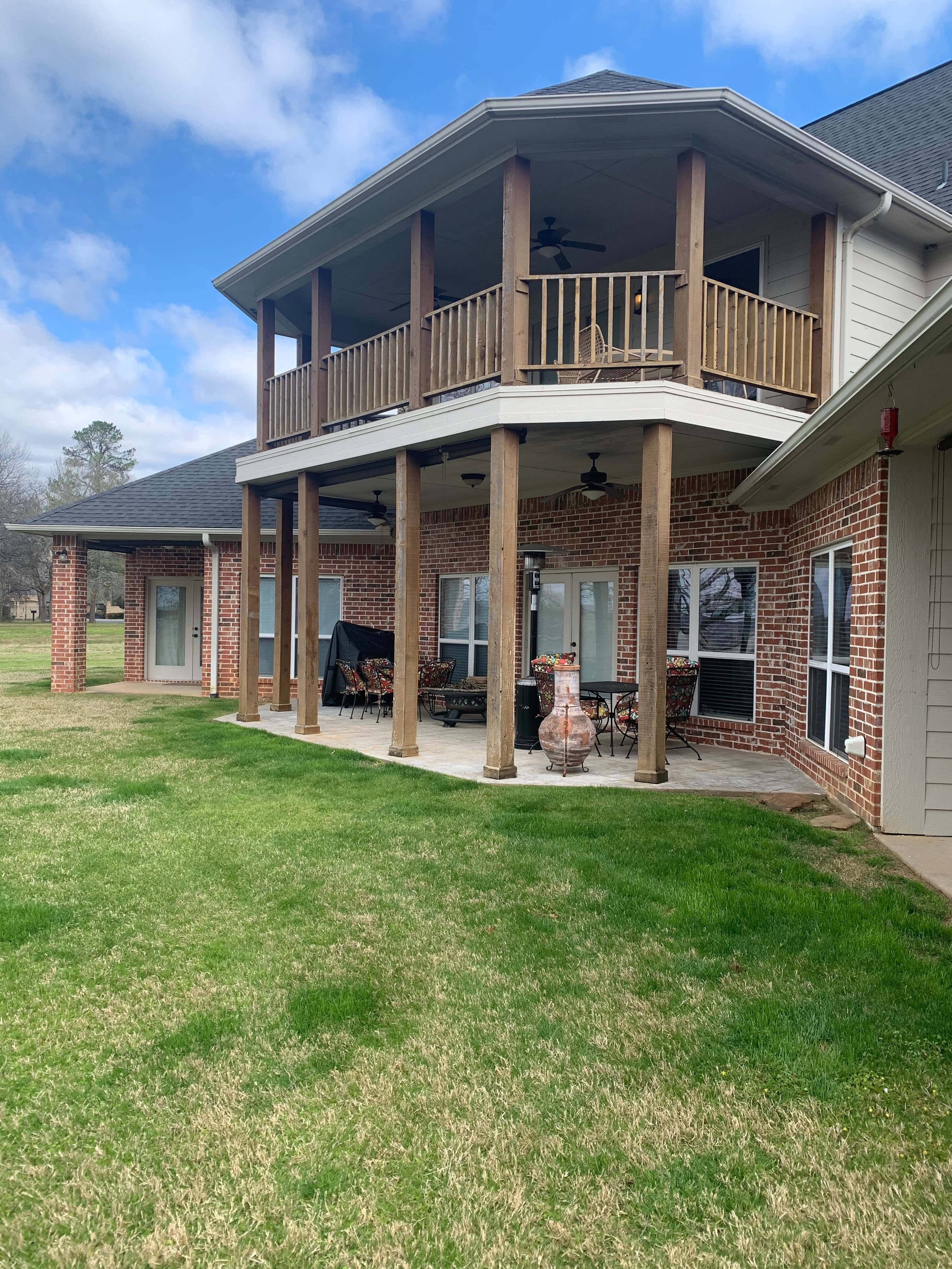 Porch posts and wood railing before updates