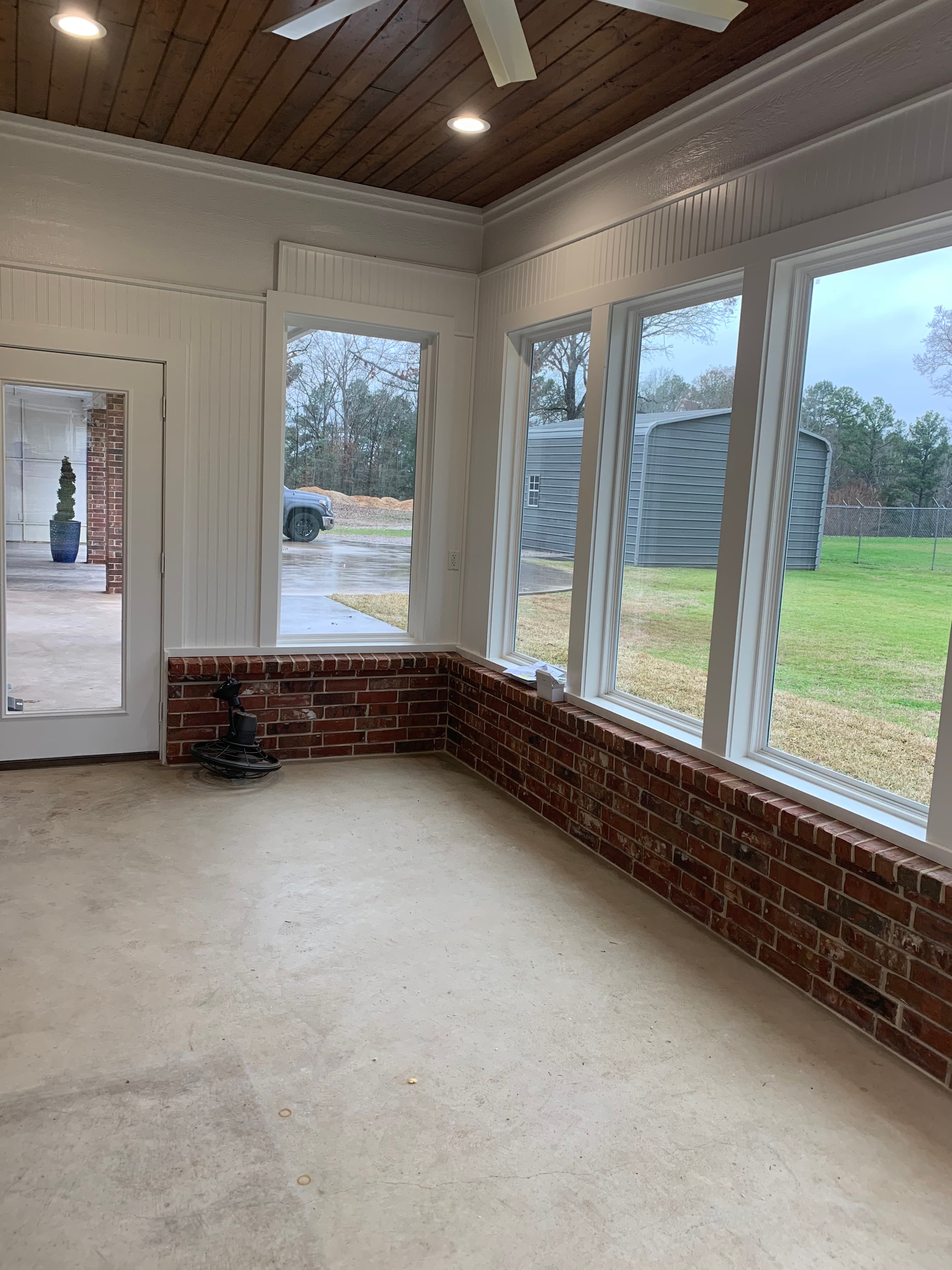 Brick wainscotting and painted bead board finish