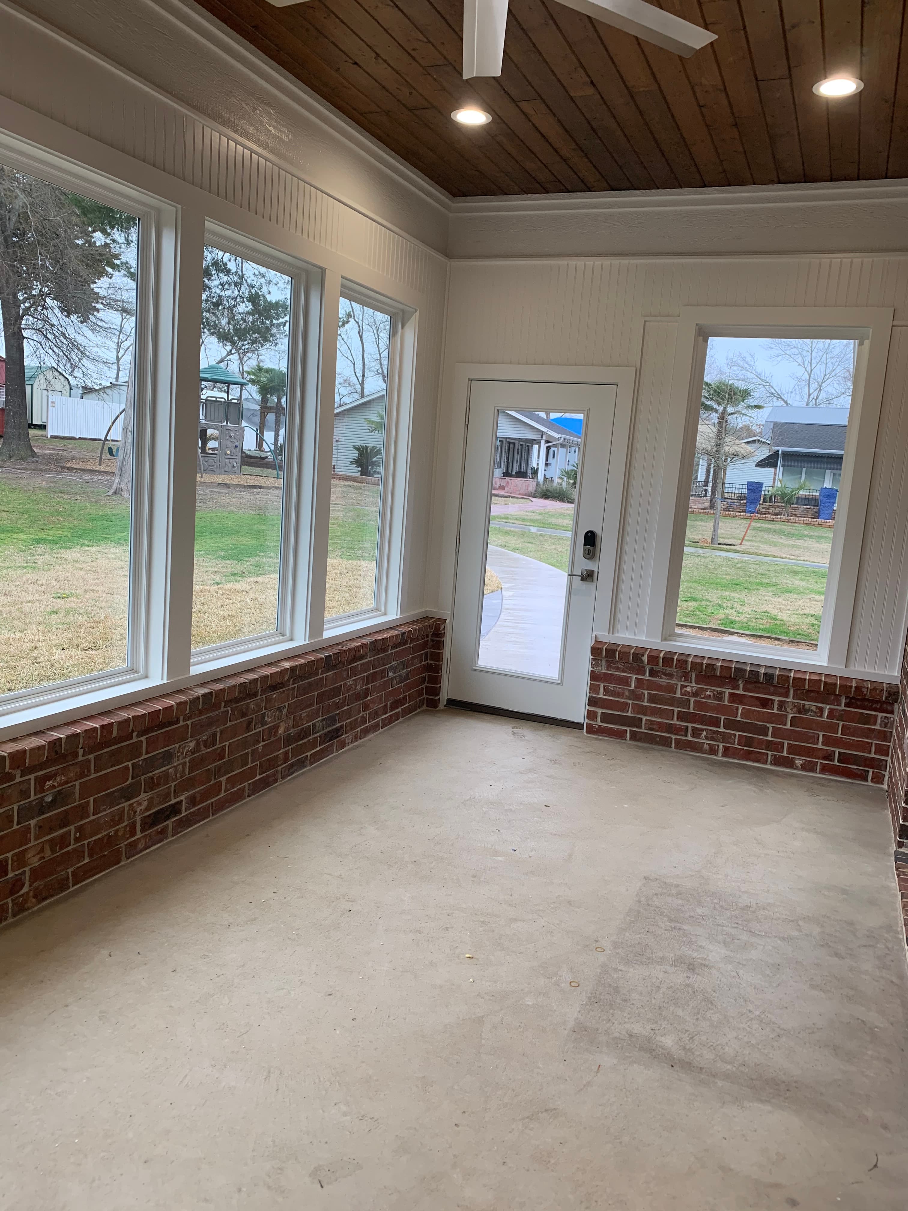 Another view of brick wainscotting and painted bead board finish