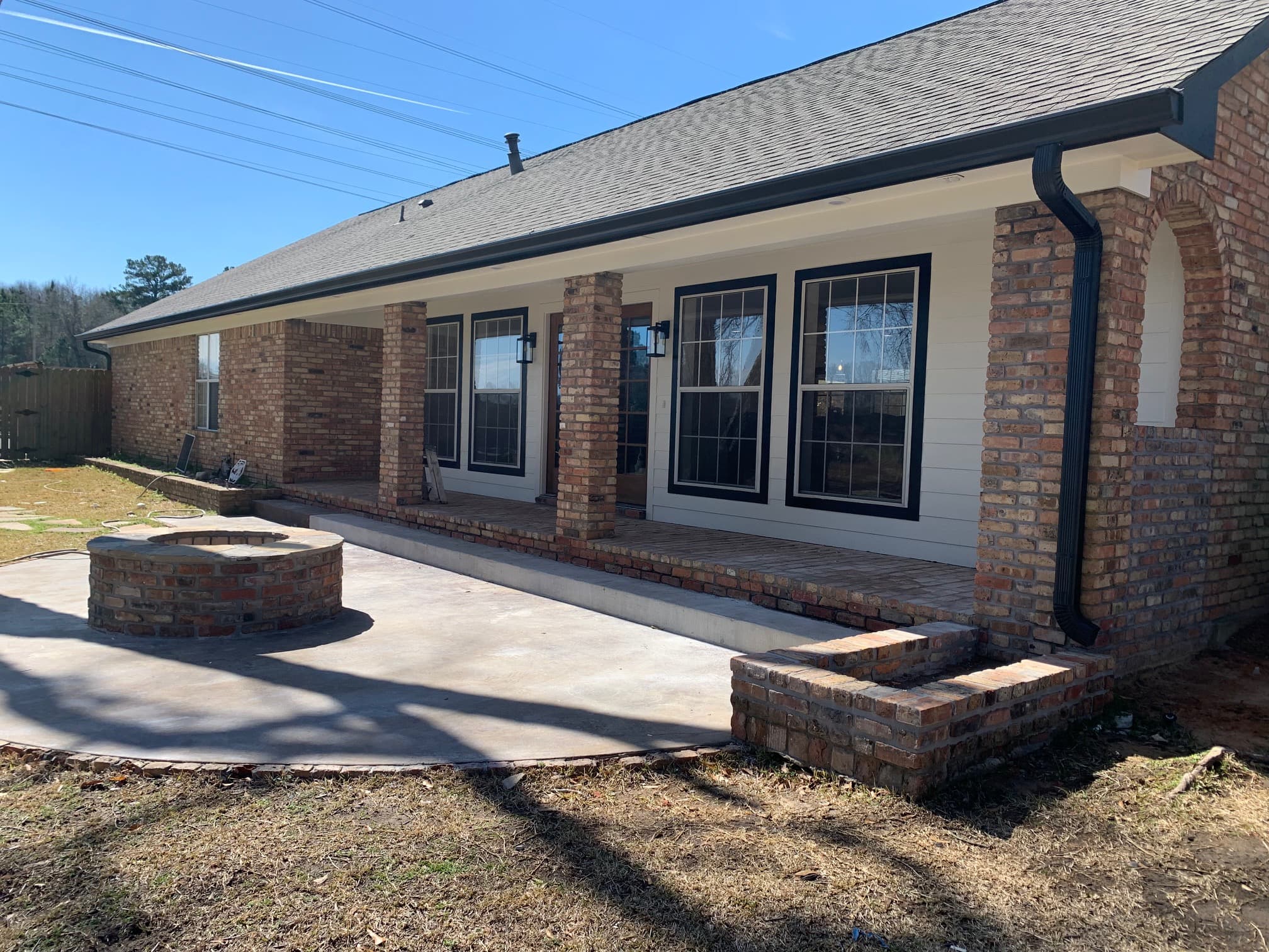 Remodeled exterior patio with firepit